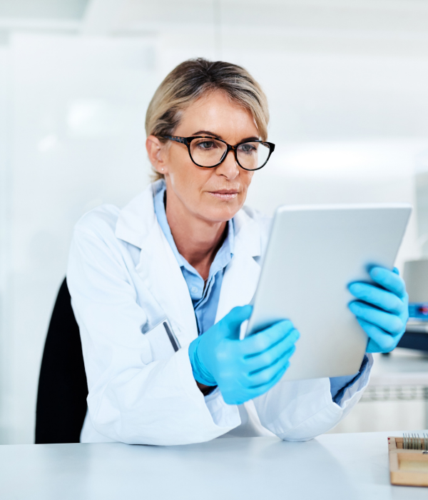 Lab worker looking at her tablet